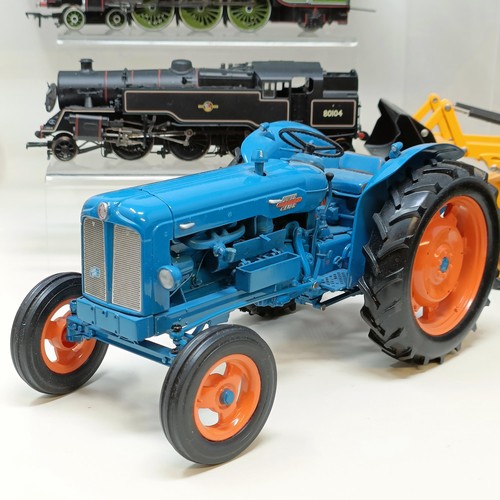 232 - A Britains model of a tractor, No. 0031SF00 and assorted other model cars all unboxed (box)