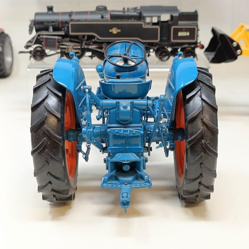 232 - A Britains model of a tractor, No. 0031SF00 and assorted other model cars all unboxed (box)