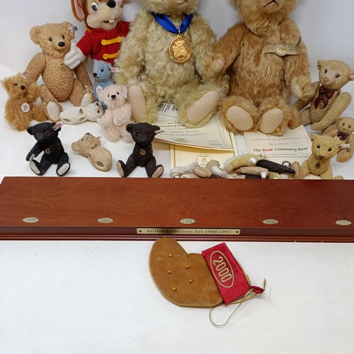 241 - A modern Steiff limited edition plush blonde teddy bear, No 5039, with certificate, and bag, two oth... 