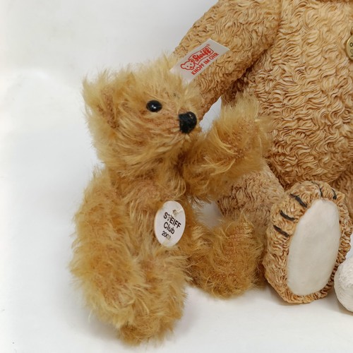 241 - A modern Steiff limited edition plush blonde teddy bear, No 5039, with certificate, and bag, two oth... 