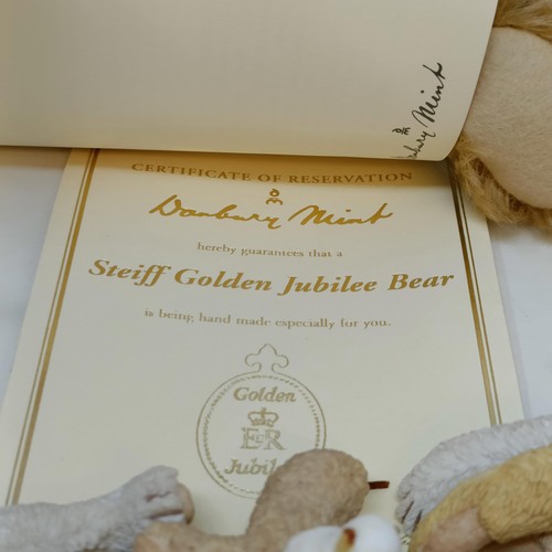 241 - A modern Steiff limited edition plush blonde teddy bear, No 5039, with certificate, and bag, two oth... 