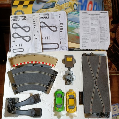 242 - A Scalextric Beetle Cup set, boxed, and another,  Endurance GT1 set, boxed (2)