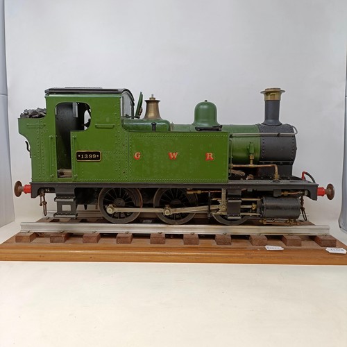 261 - A live steam 3.5 inch gauge 0-6-0 locomotive, in green livery, 50 cm, on a stand