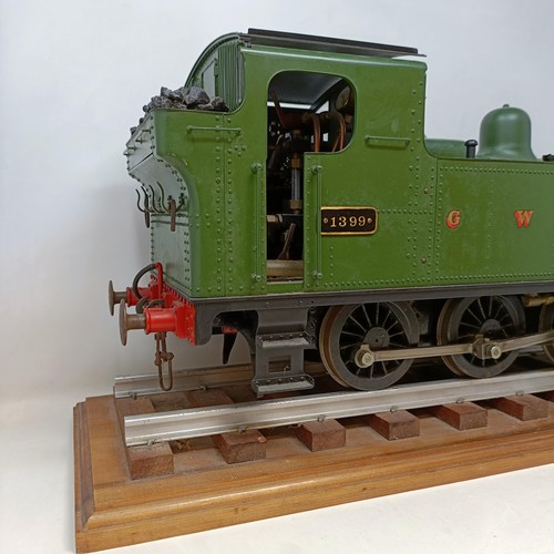 261 - A live steam 3.5 inch gauge 0-6-0 locomotive, in green livery, 50 cm, on a stand