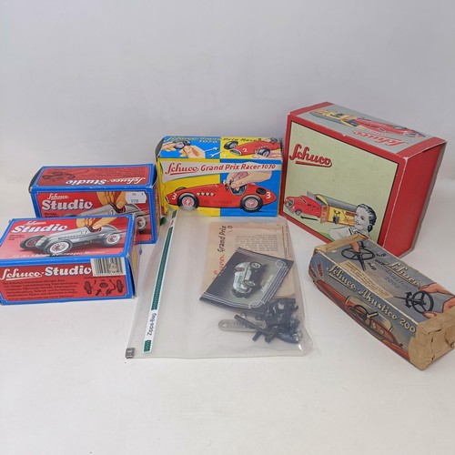 264 - A Schuco clockwork toy car No. 3041 boxed, and four other reproduction Schuco wind-up toys (5)