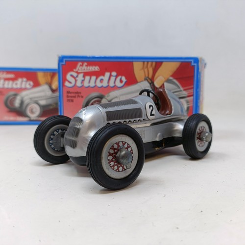 264 - A Schuco clockwork toy car No. 3041 boxed, and four other reproduction Schuco wind-up toys (5)