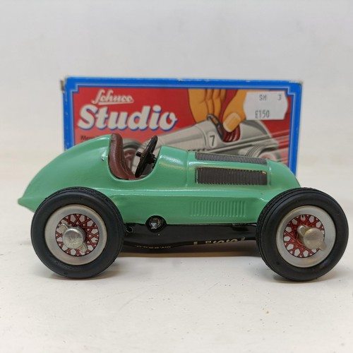 264 - A Schuco clockwork toy car No. 3041 boxed, and four other reproduction Schuco wind-up toys (5)