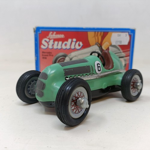 264 - A Schuco clockwork toy car No. 3041 boxed, and four other reproduction Schuco wind-up toys (5)