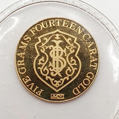 395 - A gold five gram token, for the Republic National Bank, New York