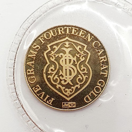 396 - A gold five gram token, for the Republic National Bank, New York