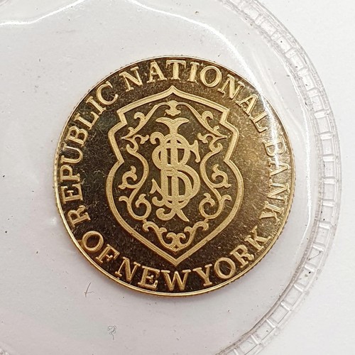 396 - A gold five gram token, for the Republic National Bank, New York