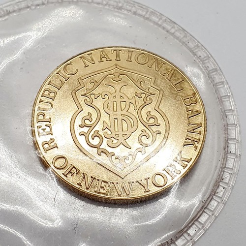 396 - A gold five gram token, for the Republic National Bank, New York