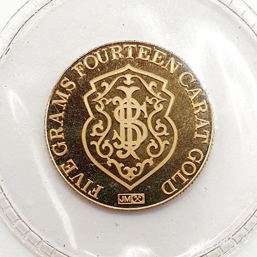 397 - A gold five gram token, for the Republic National Bank, New York