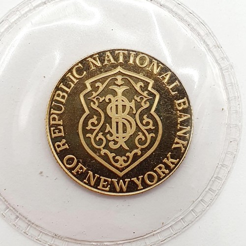 397 - A gold five gram token, for the Republic National Bank, New York