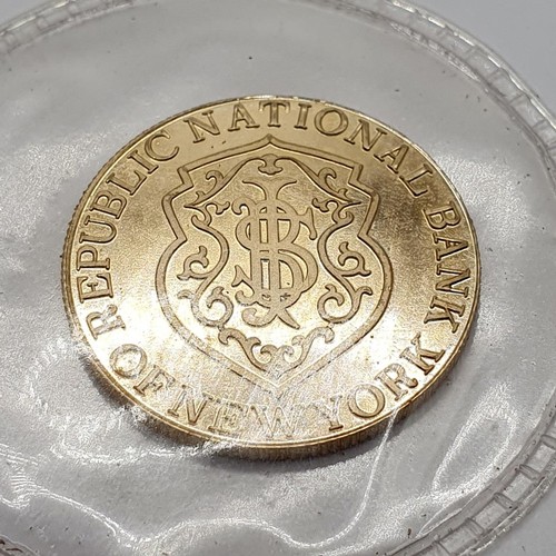 397 - A gold five gram token, for the Republic National Bank, New York