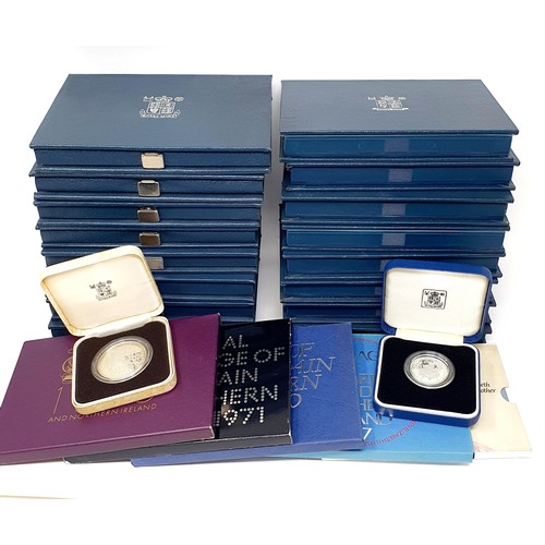 402 - A group of year proof coins sets, comprising 1970, 1971, 1977, 1982-2000, and a small group of other... 