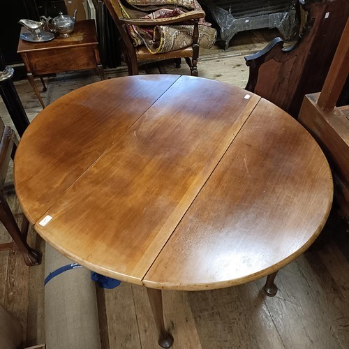 862 - A 19th century mahogany drop leaf table, on cabriole legs to pad feet, 108 cm wide