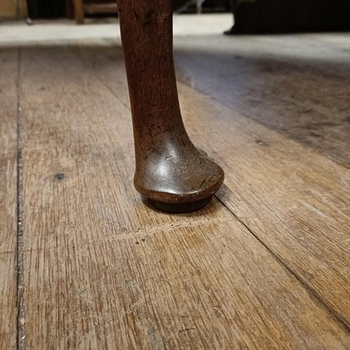 862 - A 19th century mahogany drop leaf table, on cabriole legs to pad feet, 108 cm wide