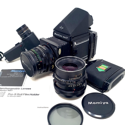 155 - A Mamiya RB67 Professional camera, various accessories, and instruction manual, in a Fotima carry ca... 