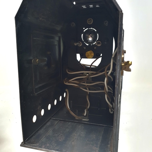 156 - A Praestantia magic lantern, in a metal case, with a parafin burner