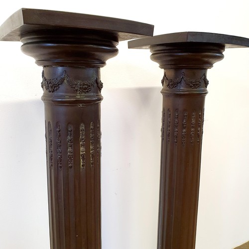 946 - A pair of composition pedestals, in the form of columns, 104 cm high (2)