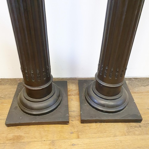 946 - A pair of composition pedestals, in the form of columns, 104 cm high (2)