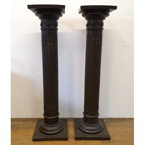 946 - A pair of composition pedestals, in the form of columns, 104 cm high (2)