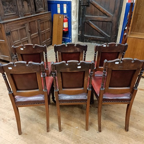 901 - A set of six late 19th century carved walnut dining chairs, with leather padded backs and seats (6)