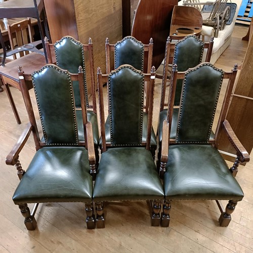 902 - A set of six oak dining chairs, with padded backs and seats (6)