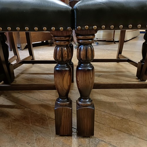 902 - A set of six oak dining chairs, with padded backs and seats (6)