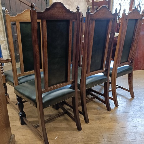 902 - A set of six oak dining chairs, with padded backs and seats (6)