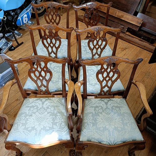 904 - A set of six Chippendale style mahogany dining chairs with pierced splats, drop in seats, cabriole l... 