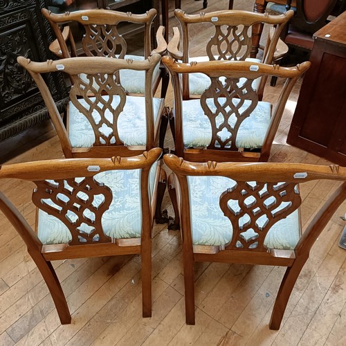 904 - A set of six Chippendale style mahogany dining chairs with pierced splats, drop in seats, cabriole l... 