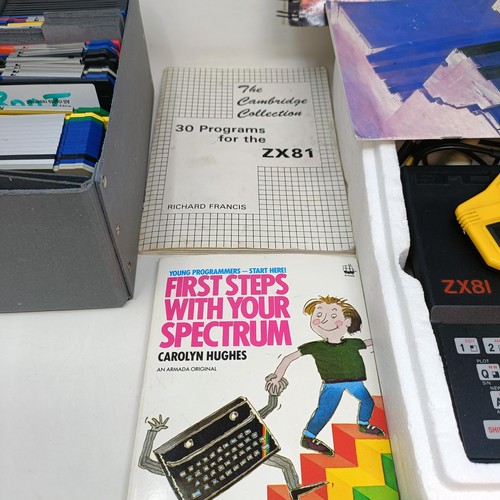 266 - A Sinclair ZX 81 computer, a Learn Basic programming pack, and assorted compact discs (box)