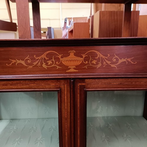 974 - An early 20th century mahogany display cabinet, 92 cm wide