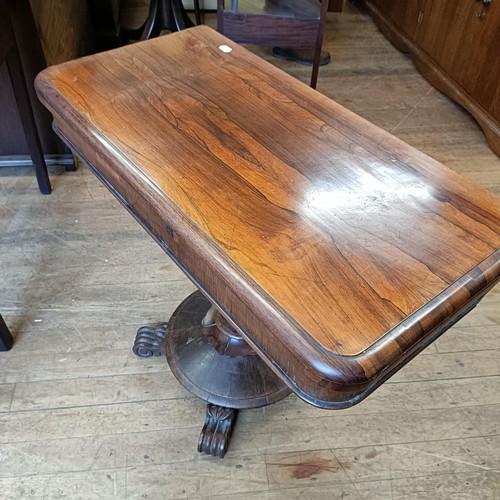 987 - A 19th century rosewood folding card table, 94 cm wide