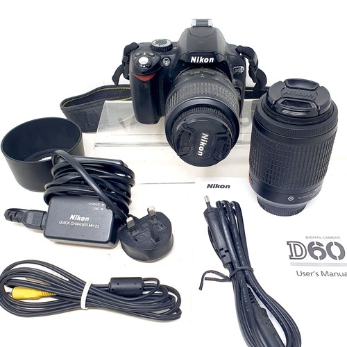 165 - A Kodak bellows camera, a Pentax ME Super camera, a Nikon D60 camera, assorted lenses, and related i... 