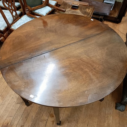 1016 - A 19th century mahogany D end dining table, with an extra leaf, 130 cm wide