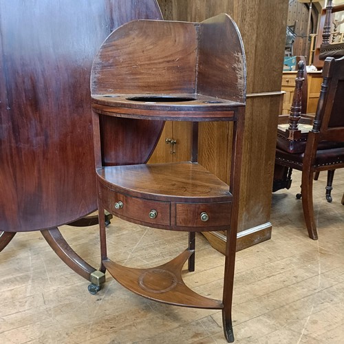 1040 - A tilt top mahogany breakfast table, 120 cm diameter, and a washstand