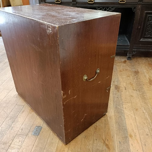 1042 - A mahogany and brass bound campaign style chest, having three drawers, 80 cm wide