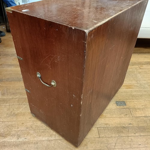 1042 - A mahogany and brass bound campaign style chest, having three drawers, 80 cm wide