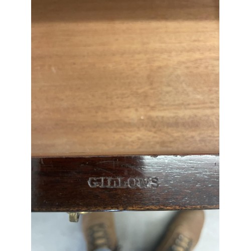 973 - A Gillows mahogany dressing table, the central drawer stamped, 128 cm wide