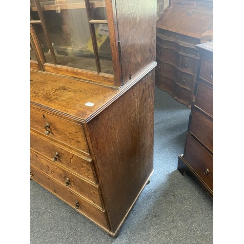 959 - A 19th century oak bookcase on chest, 212 cm high x 94 cm wide