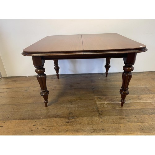 968 - A 19th century mahogany extending dining table, top 125 cm x 120 cm, lacking leaves