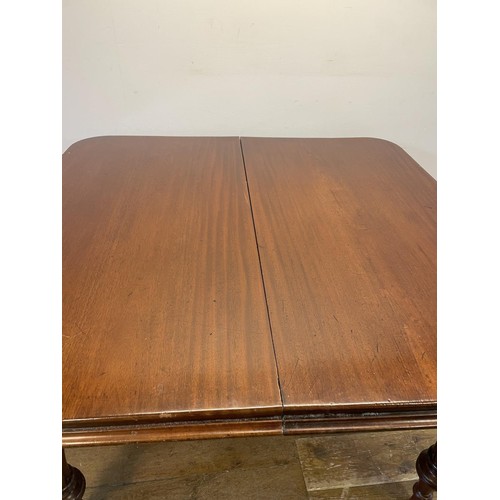 968 - A 19th century mahogany extending dining table, top 125 cm x 120 cm, lacking leaves