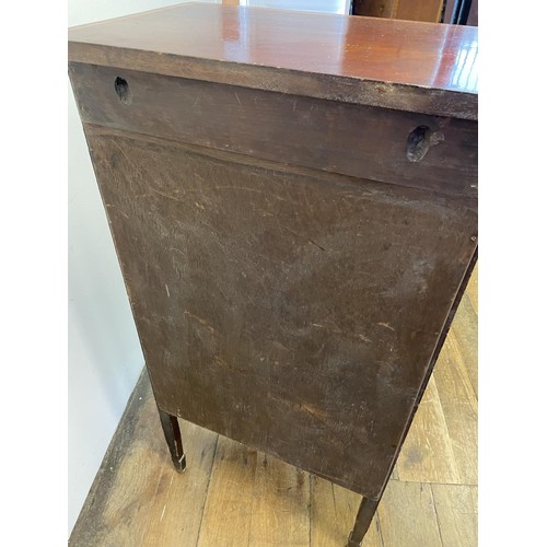 965 - An Edwardian mahogany music cabinet, with a leaded glazed door, 60 cm wide