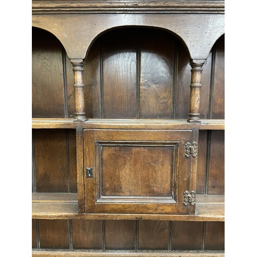 1029 - An oak kitchen dresser, 124 cm wide