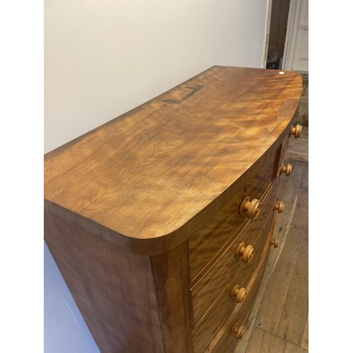 936 - A late Victorian mahogany bow front chest, having two short and three long drawers, 119 cm wide