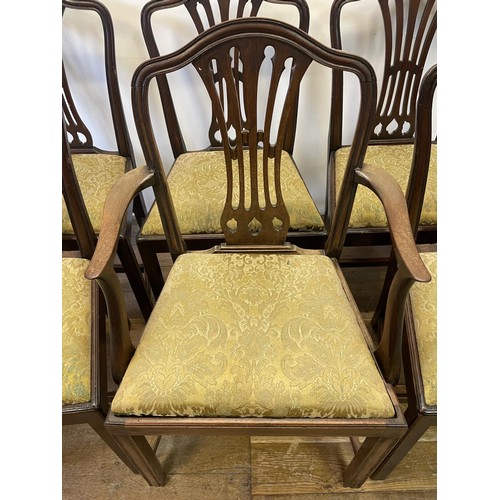 899 - A set of seven  George III style mahogany dining chairs, with pierced splat backs, drop in seats and... 