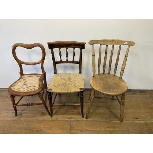 895 - A Windsor style armchair, another, assorted other chairs and an oak coat hook (8)